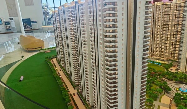 Close-up view of Nambiar District 25 apartment tower facade displaying the balcony structure and modern architectural design